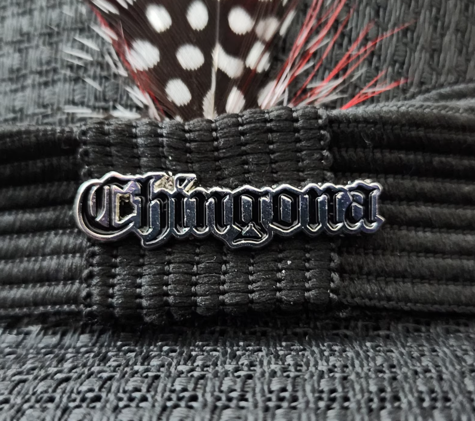 Chingona Lapel Pin – Bold Empowerment Accessory for Jackets, Hats, and Clothing